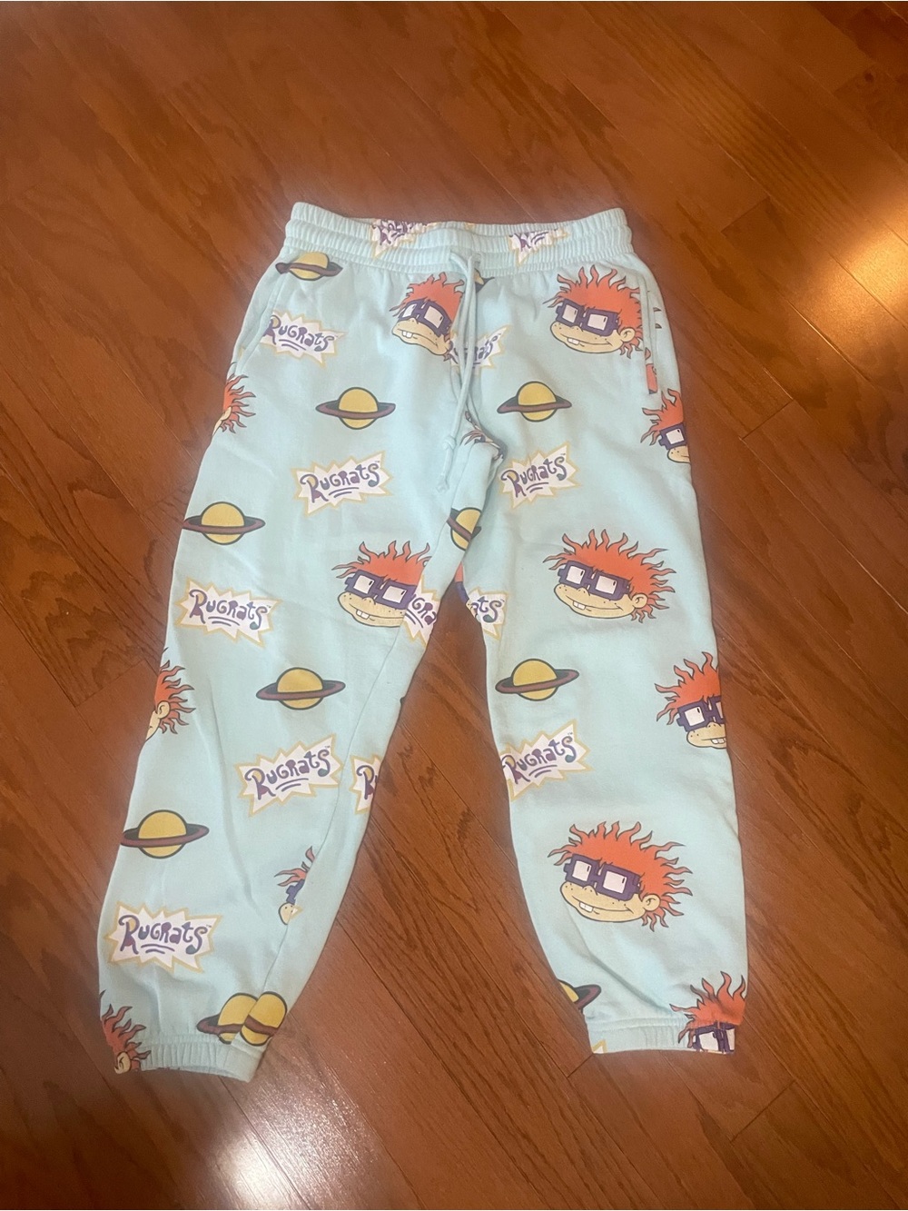 Rugrats Light Aqua Sweatpants by Nickelodeon with Yellow & Purple Accents